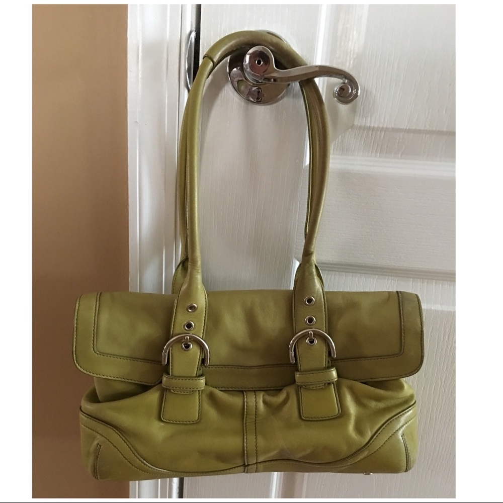Used condition authentic coach pocket book.